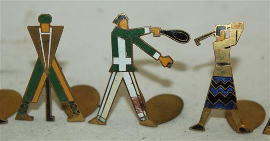 Eight German / Austrian Art Deco brass and enamel sports people menu holders, 3.8cm - 4cm